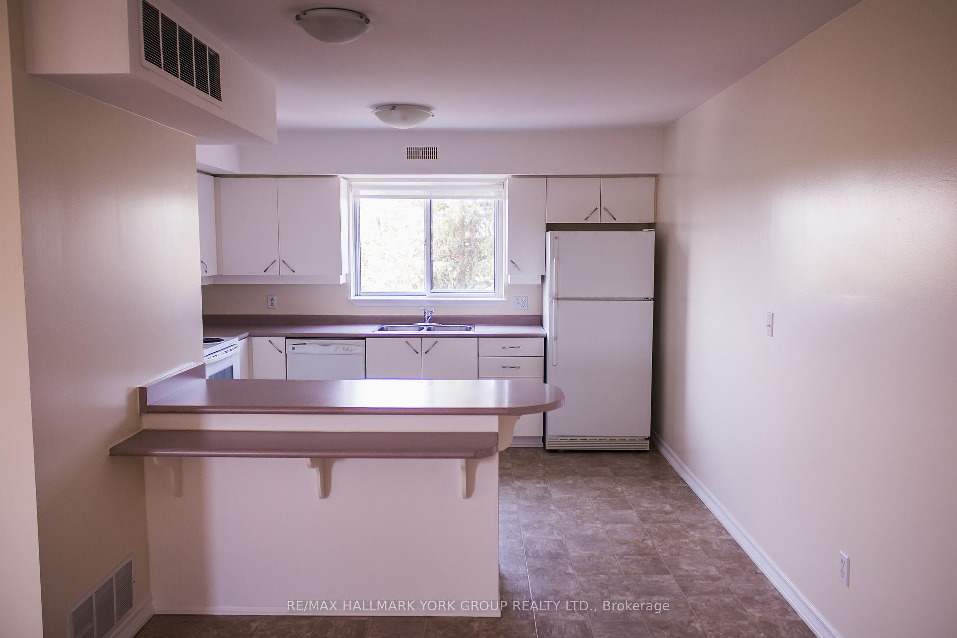 Photo 4 of Unit 401, 143 Edgehill Drive, Barrie, Letitia Heights — HOMEH