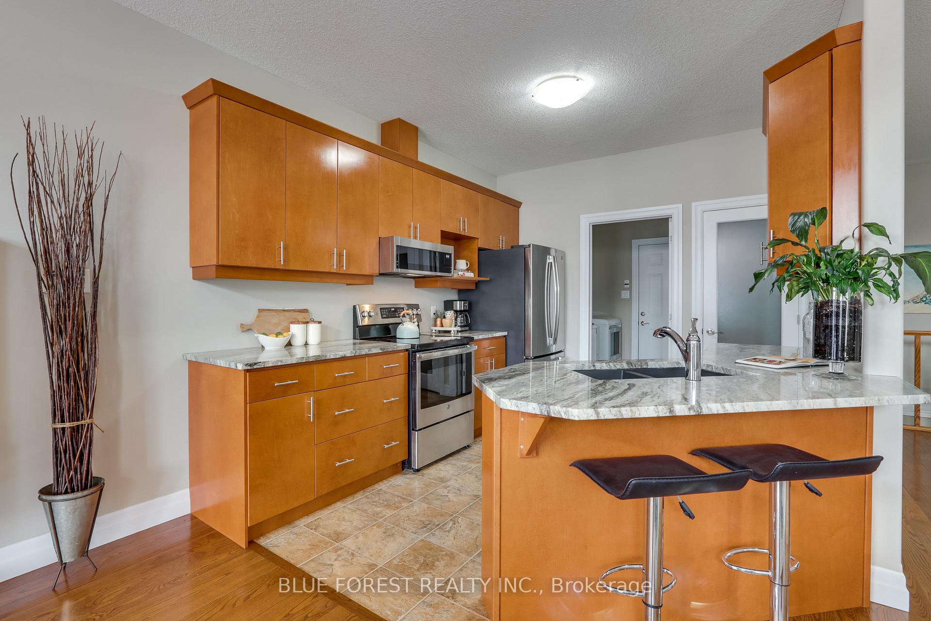 Photo 12 of Unit 8, 10 Foxhollow Drive, Thames Centre, Dorchester — HOMEH