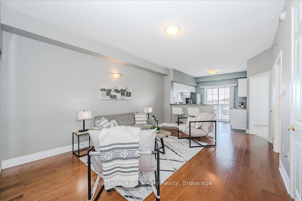Photo 1 of Unit 304, 308 Watson Parkway N, Guelph, Grange Road — HOMEH