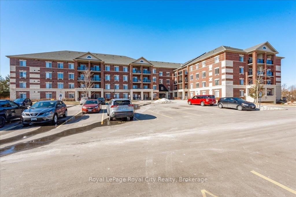 Photo 2 of Unit 304, 308 Watson Parkway N, Guelph, Grange Road — HOMEH