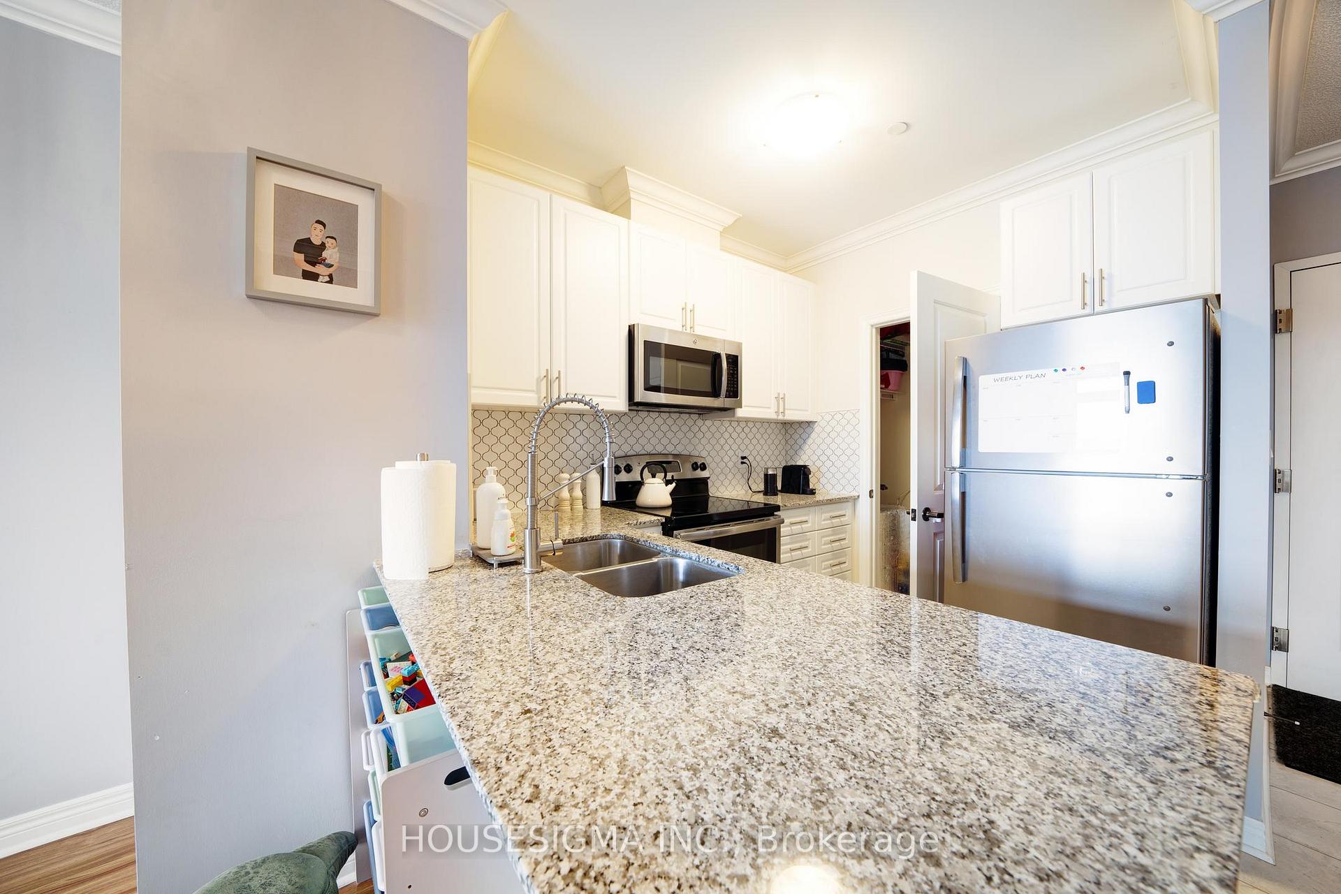 Photo 10 of Unit 401, 7768 Kennedy Road, Markham, Milliken Mills West — HOMEH