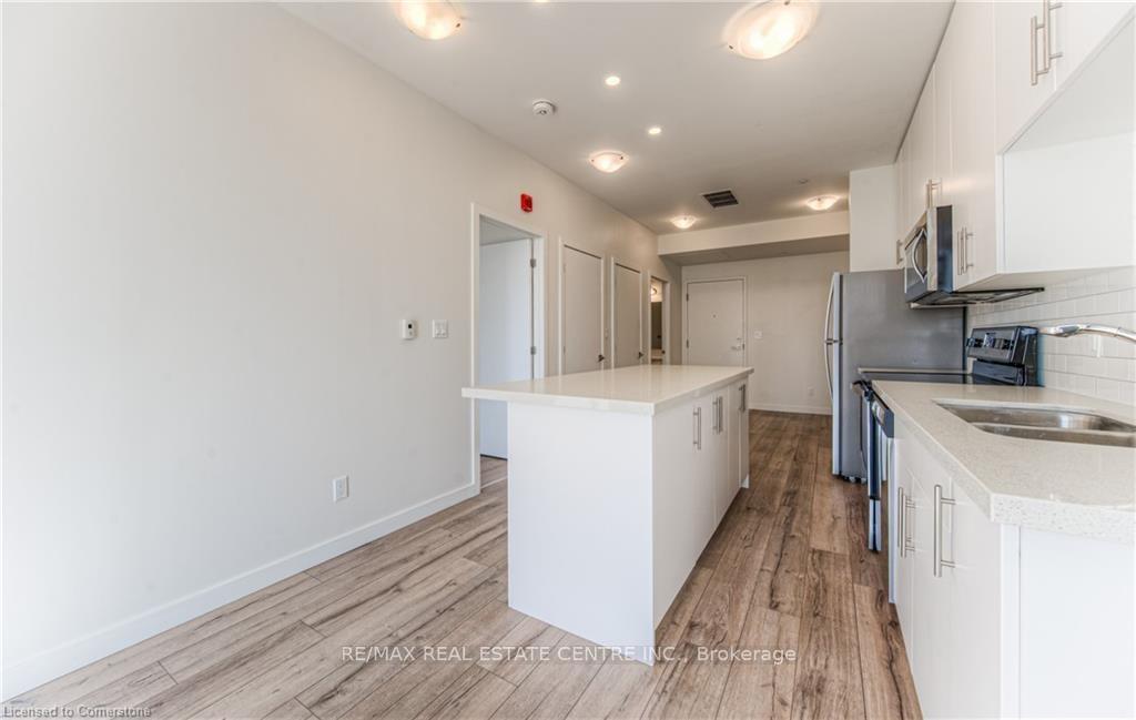 Photo 17 of Unit 609, 690 King Street W, Kitchener — HOMEH