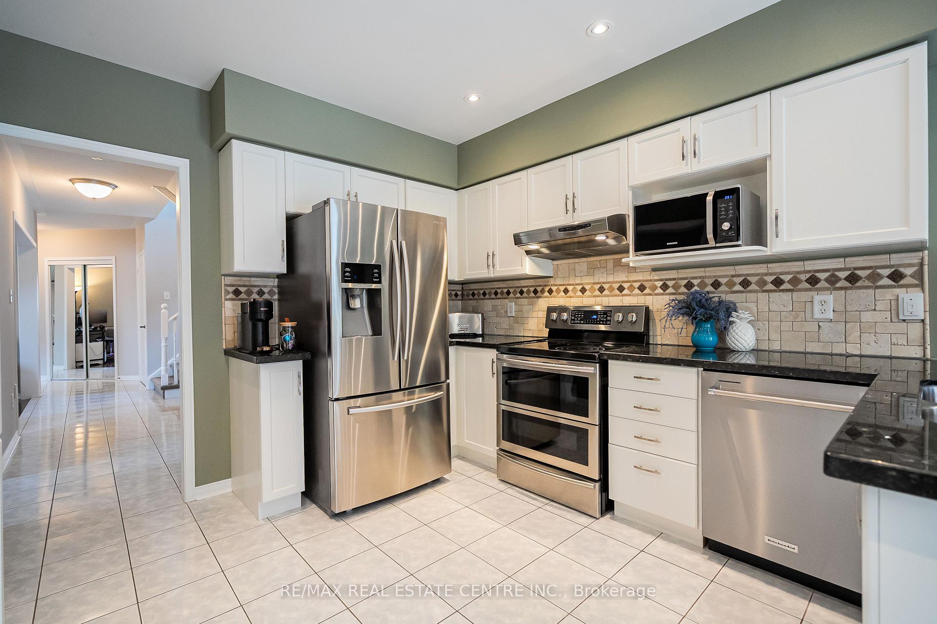 Photo 4 of 45 Culture Crescent, Brampton, Fletcher's Creek Village — HOMEH