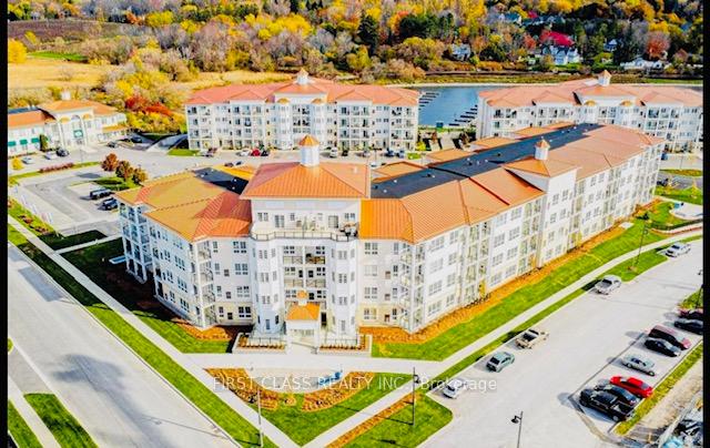 Photo 1 of Unit 206, 50 Lakebreeze Drive, Clarington, Newcastle — HOMEH