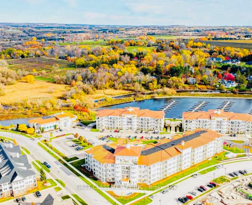 Photo 2 of Unit 206, 50 Lakebreeze Drive, Clarington, Newcastle — HOMEH