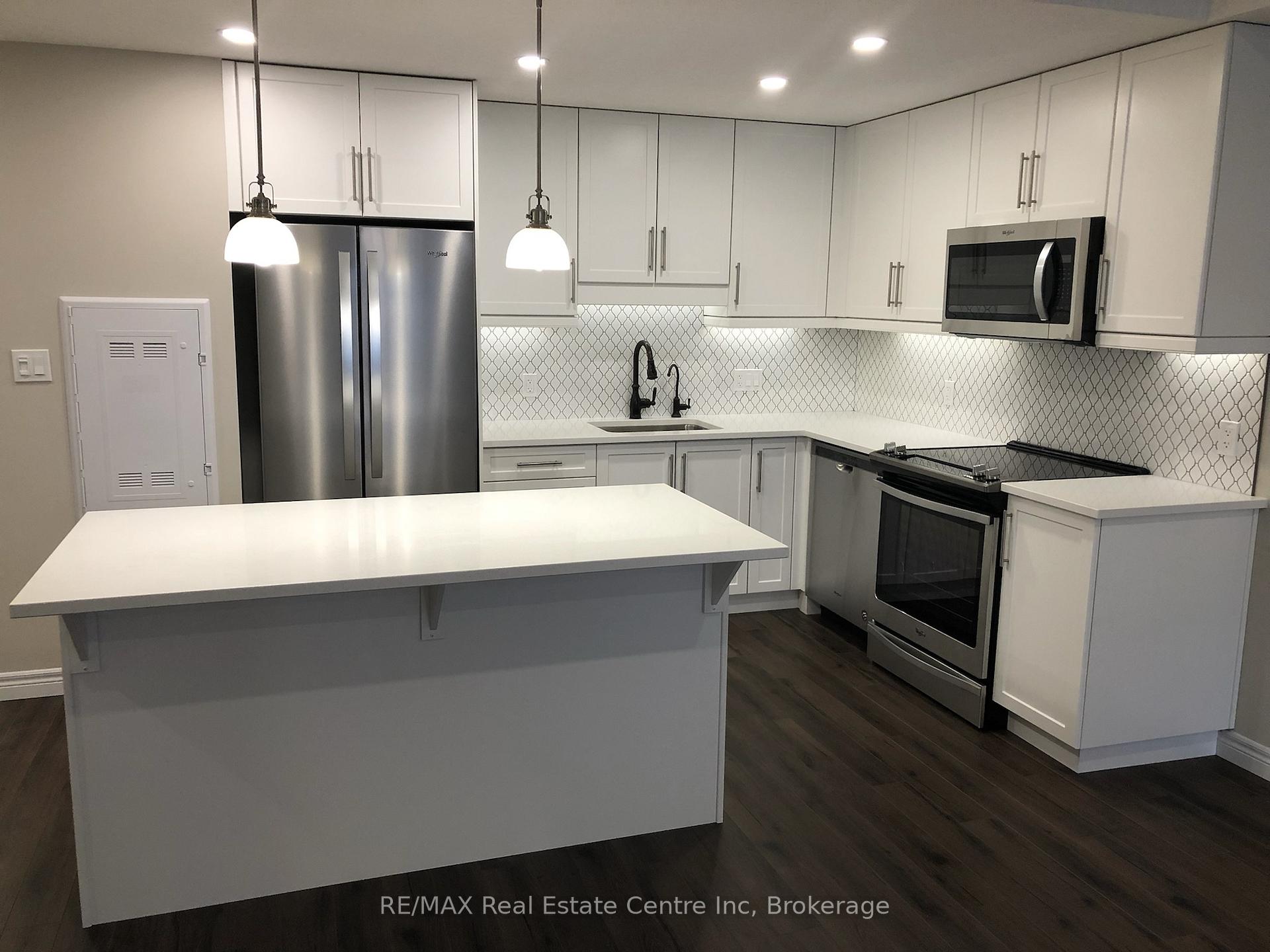 Photo 5 of Unit 101, 333 Gosling Gardens, Guelph, Clairfields/Hanlon Business Park — HOMEH