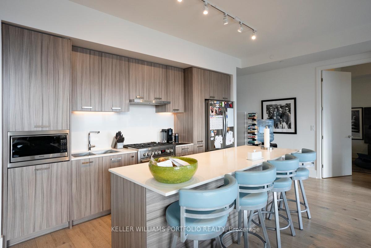 Photo 3 of Unit 802, 1331 Queen Street E, Toronto, South Riverdale — HOMEH