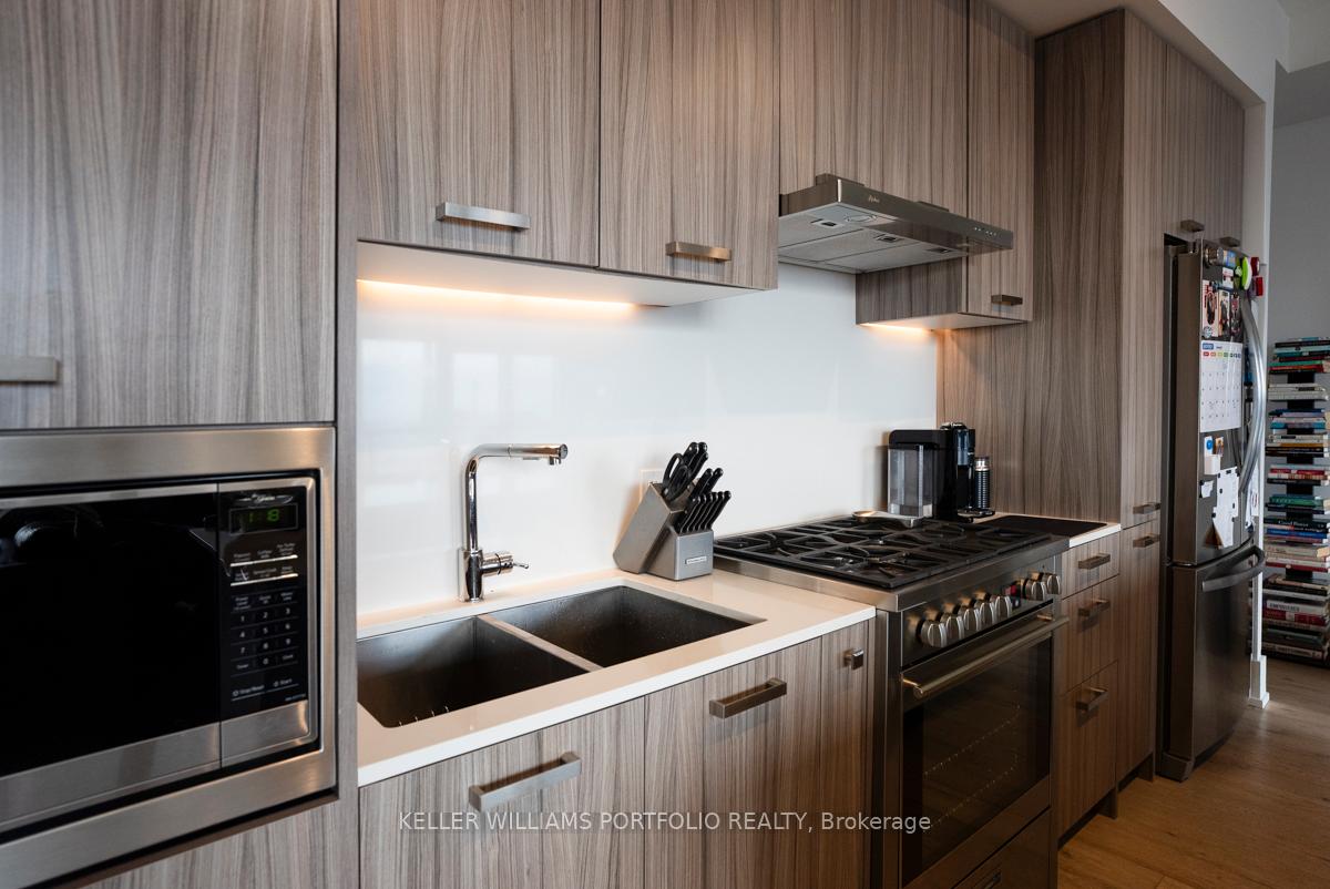 Photo 4 of Unit 802, 1331 Queen Street E, Toronto, South Riverdale — HOMEH