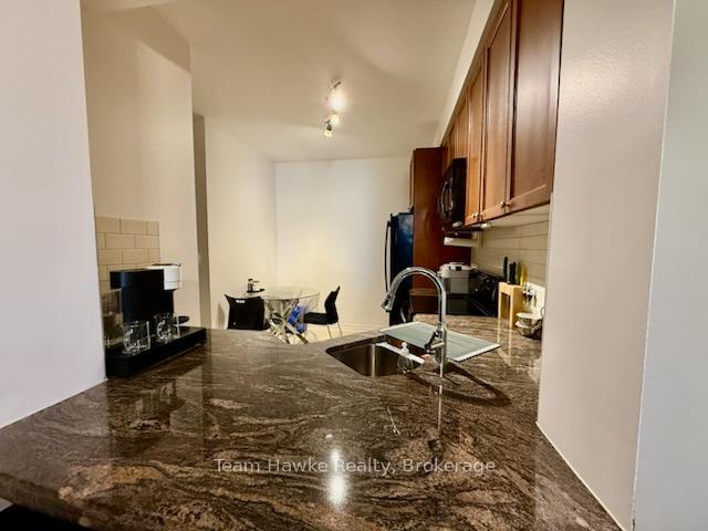Photo 3 of Unit 606, 699 Aberdeen Boulevard, Midland — HOMEH
