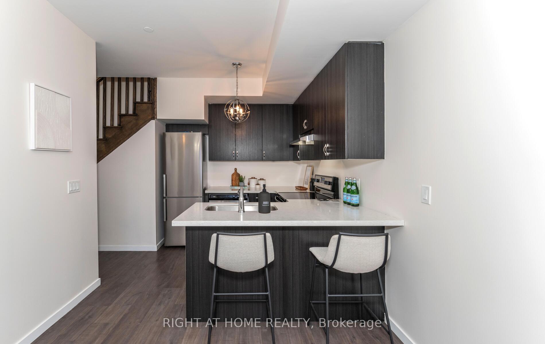 Photo 9 of Unit #25, 200 Alex Gardner Circle, Aurora, Aurora Heights — HOMEH