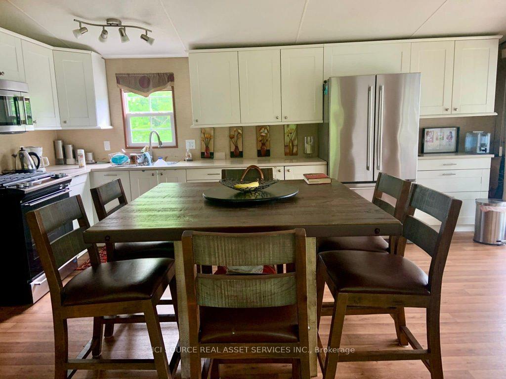 Photo 6 of Unit MRNW005, 1336 S Morrison Lake Road, Gravenhurst, Wood (Gravenhurst) — HOMEH