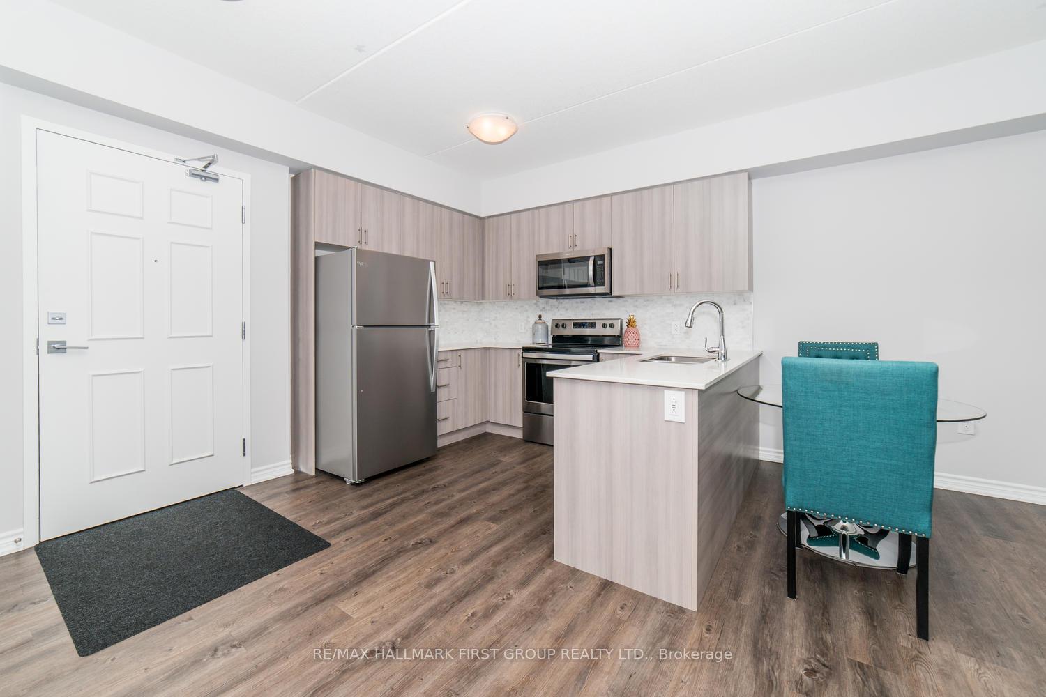 Photo 1 of Unit 210, 290 Liberty Street, Clarington, Bowmanville — HOMEH