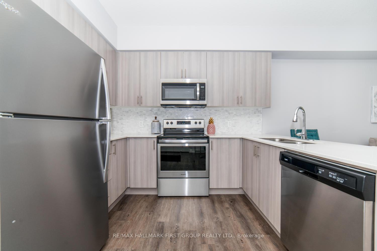 Photo 2 of Unit 210, 290 Liberty Street, Clarington, Bowmanville — HOMEH