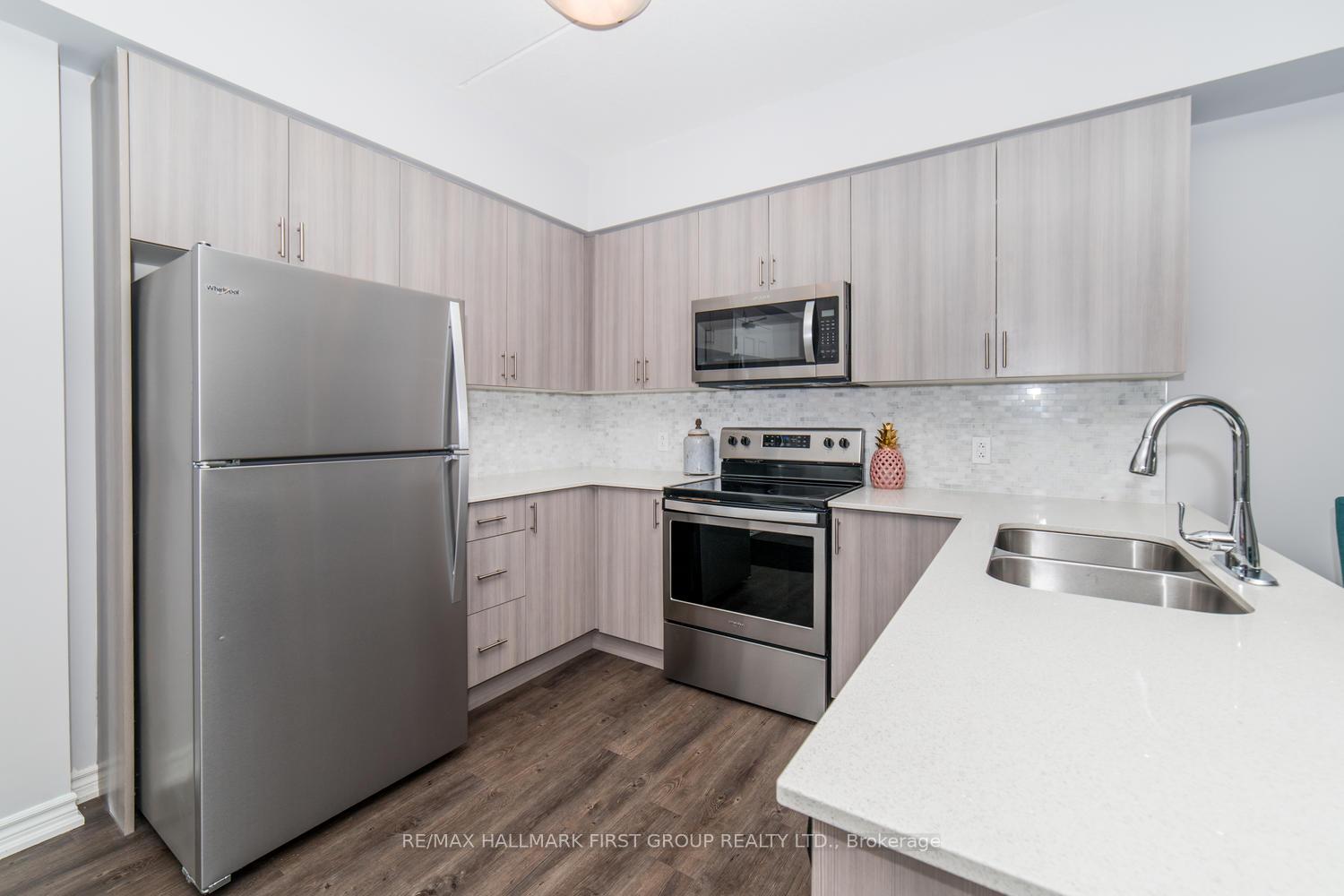 Photo 4 of Unit 210, 290 Liberty Street, Clarington, Bowmanville — HOMEH