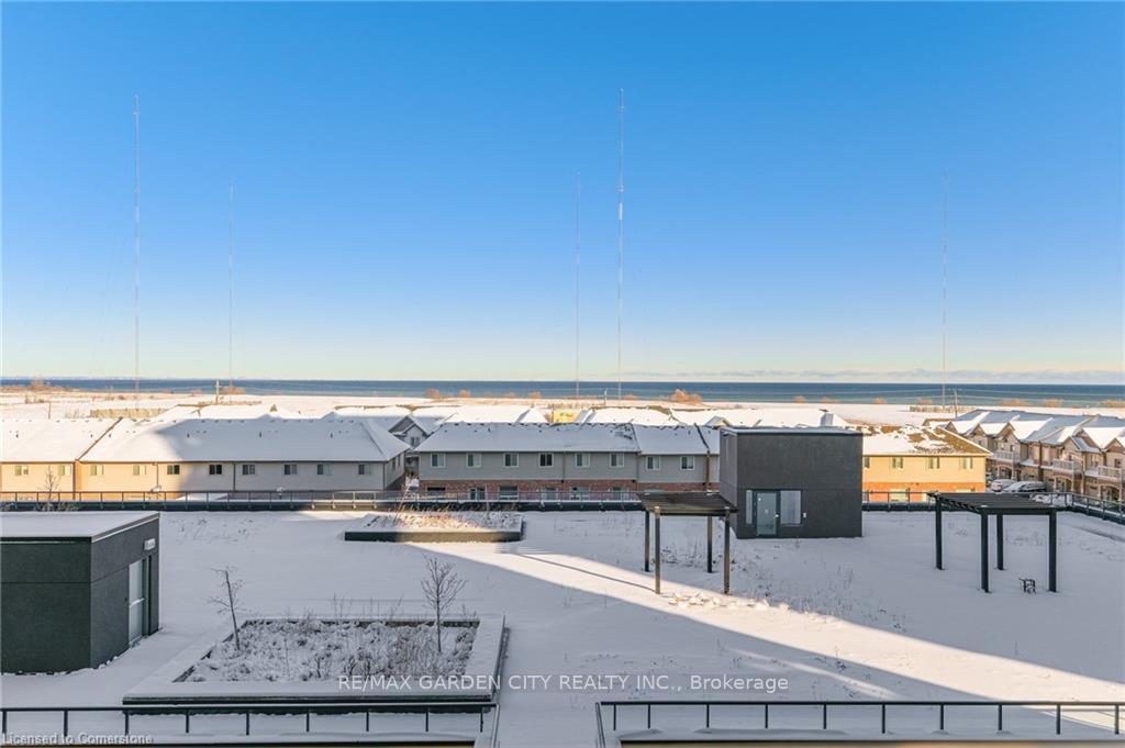 Photo 2 of Unit 408, 560 North Service Road, Grimsby, Grimsby Beach — HOMEH