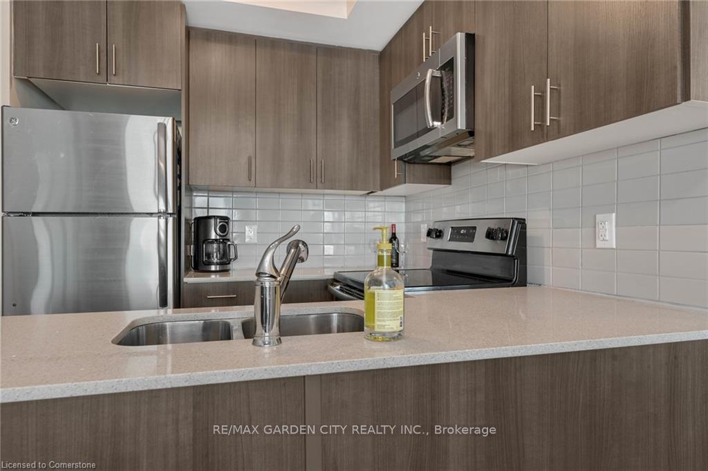 Photo 4 of Unit 408, 560 North Service Road, Grimsby, Grimsby Beach — HOMEH