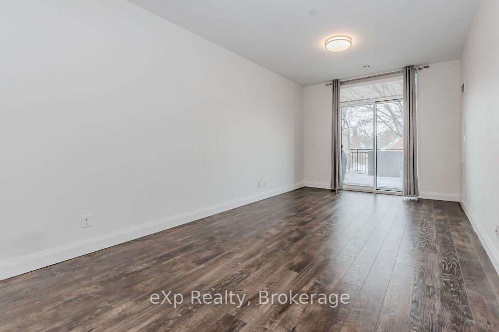 Photo 6 of Unit 107, 399 Queen Street S, Kitchener — HOMEH