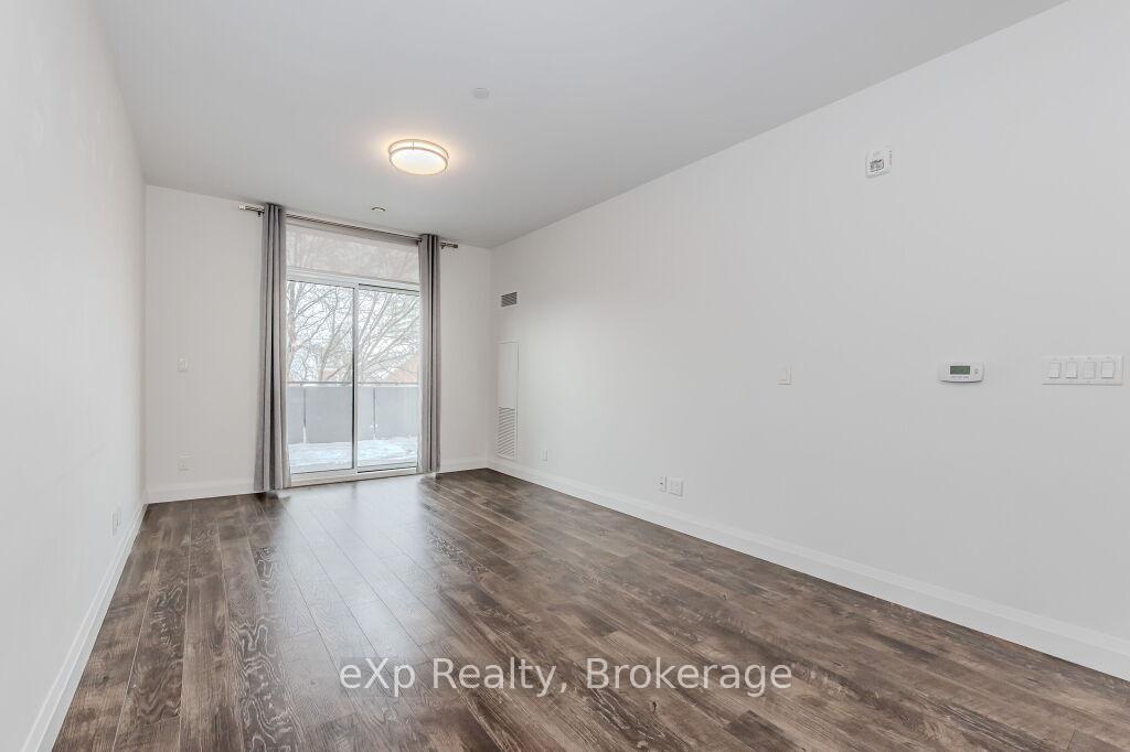Photo 7 of Unit 107, 399 Queen Street S, Kitchener — HOMEH