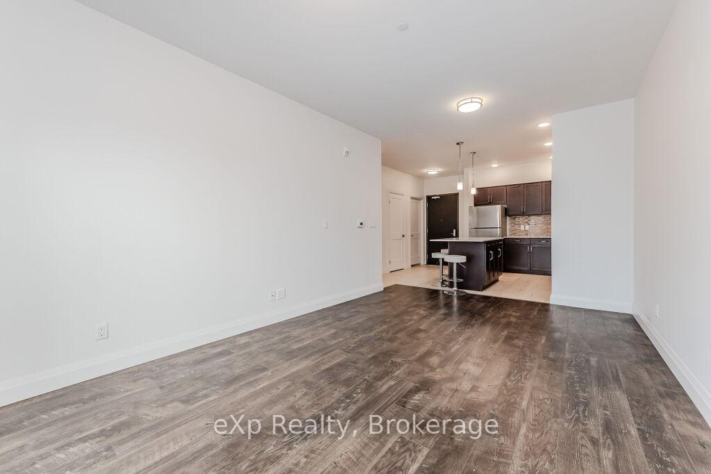 Photo 8 of Unit 107, 399 Queen Street S, Kitchener — HOMEH