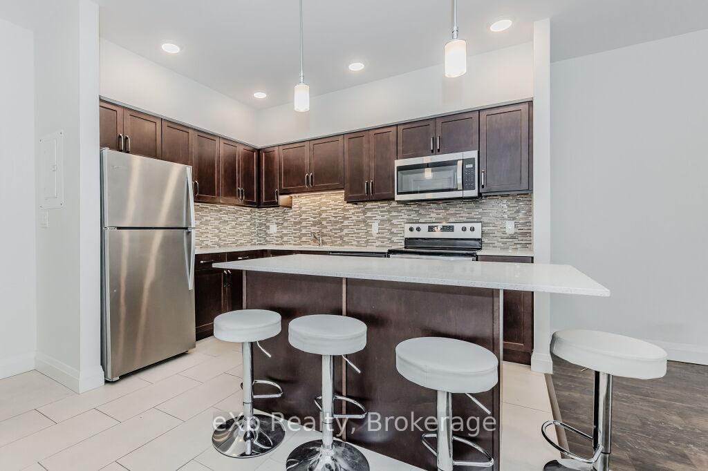 Photo 9 of Unit 107, 399 Queen Street S, Kitchener — HOMEH