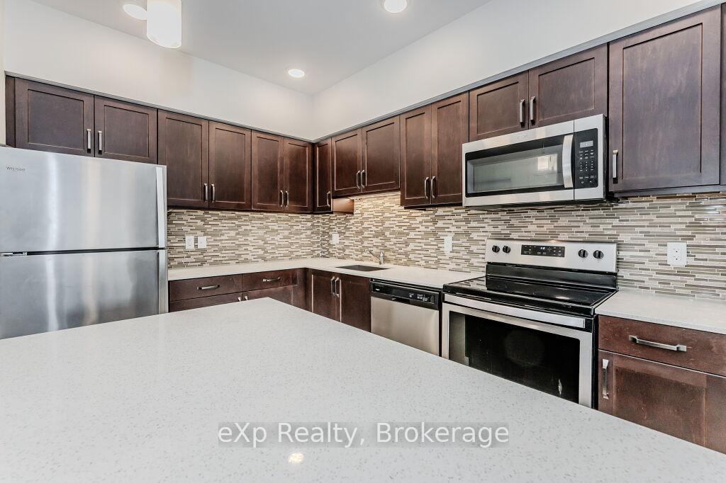 Photo 10 of Unit 107, 399 Queen Street S, Kitchener — HOMEH