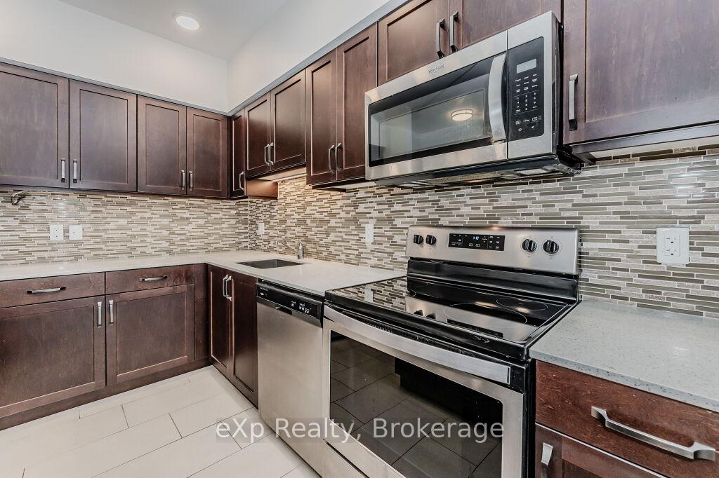 Photo 11 of Unit 107, 399 Queen Street S, Kitchener — HOMEH