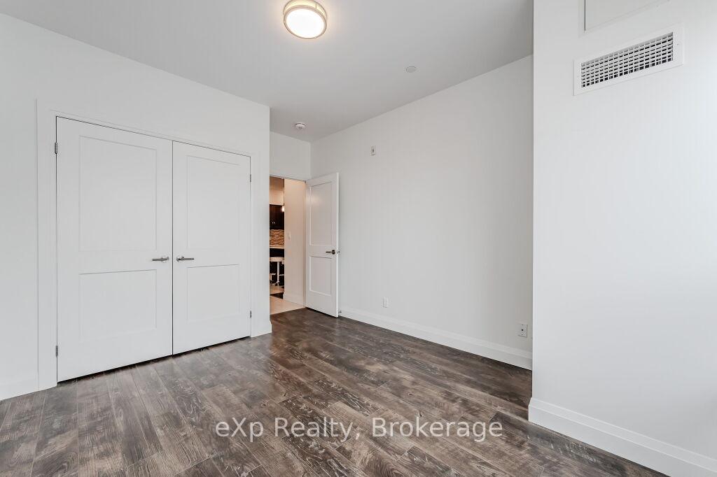 Photo 15 of Unit 107, 399 Queen Street S, Kitchener — HOMEH