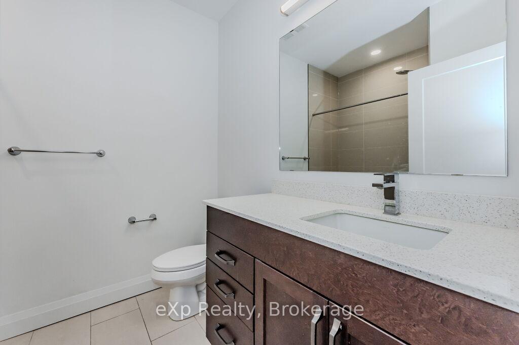 Photo 16 of Unit 107, 399 Queen Street S, Kitchener — HOMEH