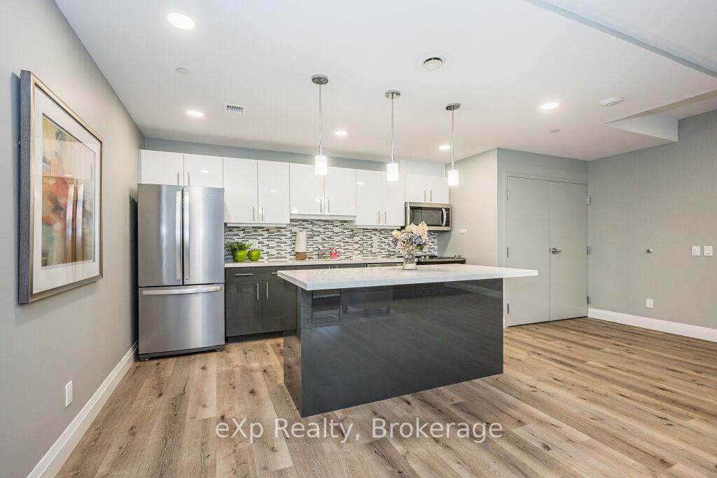 Photo 23 of Unit 107, 399 Queen Street S, Kitchener — HOMEH