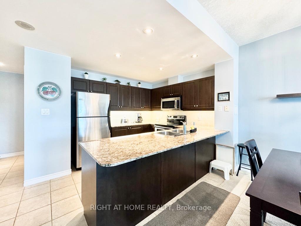 Photo 3 of Unit 703, 37 Ellen Street, Barrie, City Centre — HOMEH