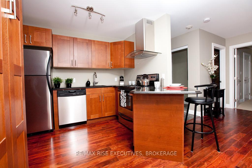 Photo 3 of Unit 210, 810 Blackburn Mews, Kingston, North of Taylor-Kidd Blvd — HOMEH