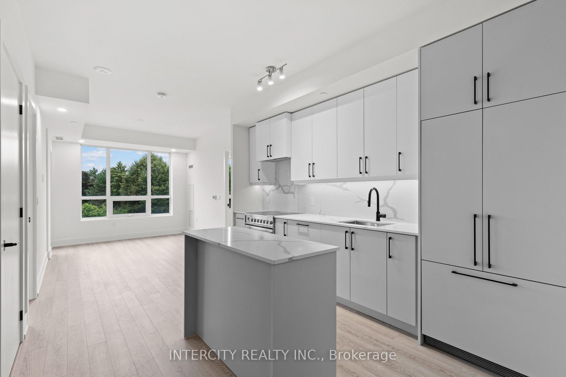 Photo 3 of Unit 304, 2075 King Road, King, King City — HOMEH