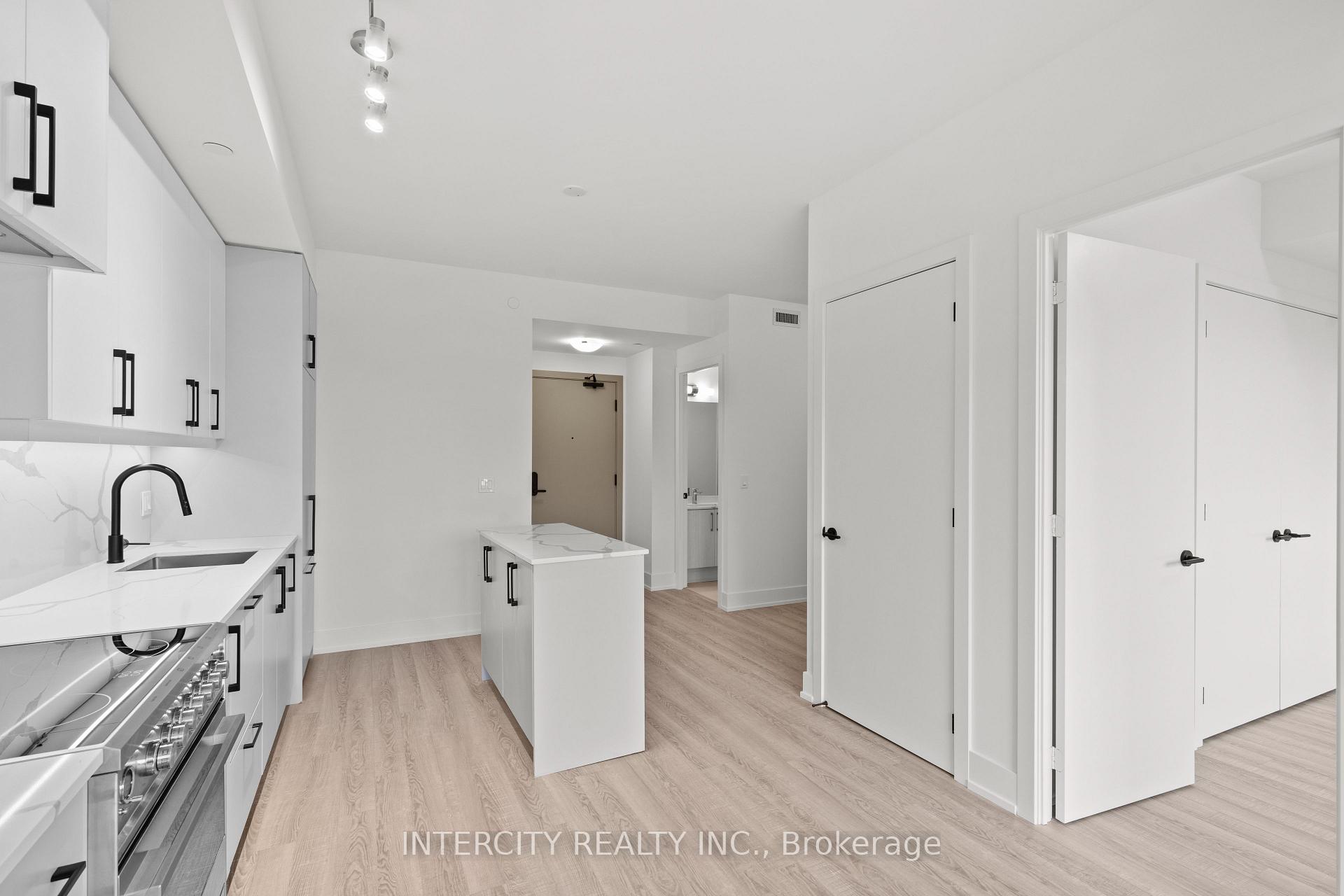 Photo 4 of Unit 304, 2075 King Road, King, King City — HOMEH