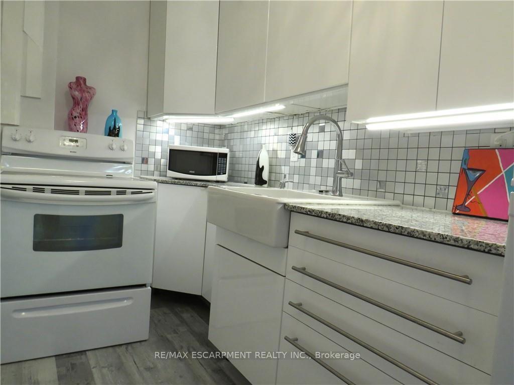Photo 4 of Unit 307, 30 Summit Avenue, Hamilton, Eastmount — HOMEH