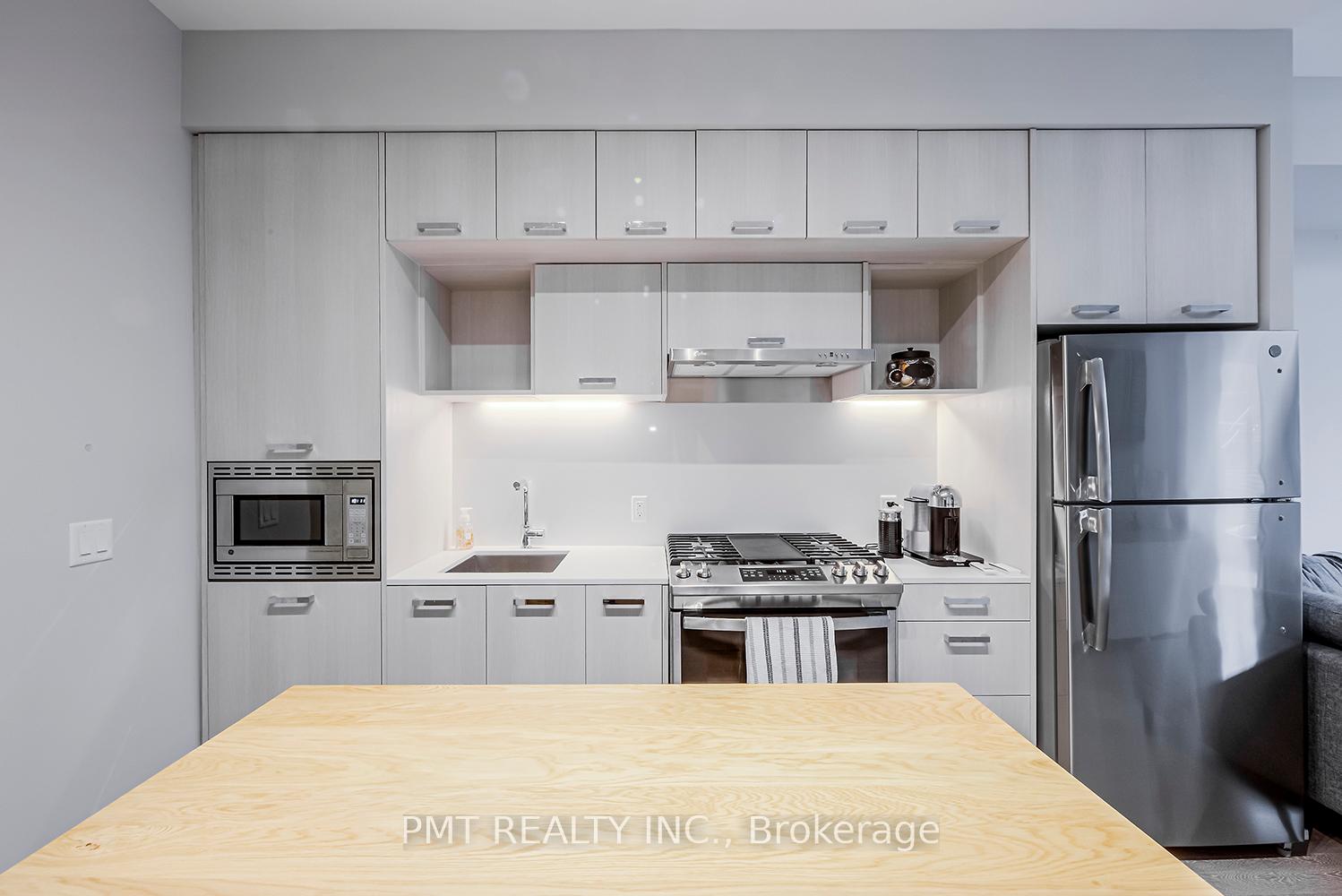 Photo 3 of Unit 105, 1331 Queen Street E, Toronto, Greenwood-Coxwell — HOMEH