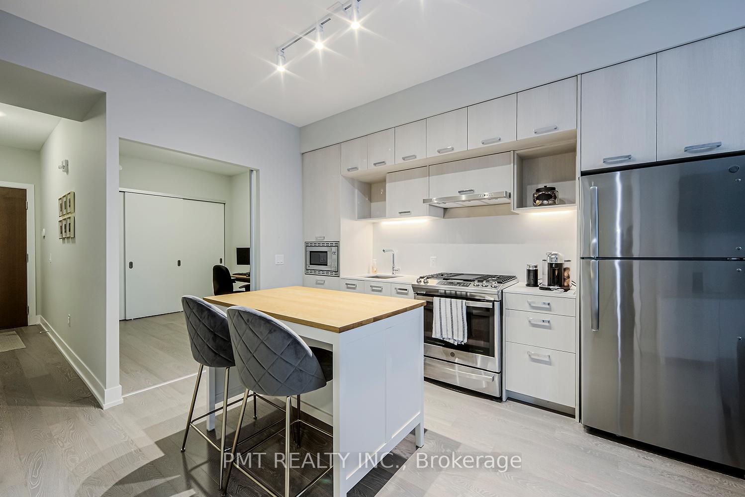 Photo 4 of Unit 105, 1331 Queen Street E, Toronto, Greenwood-Coxwell — HOMEH