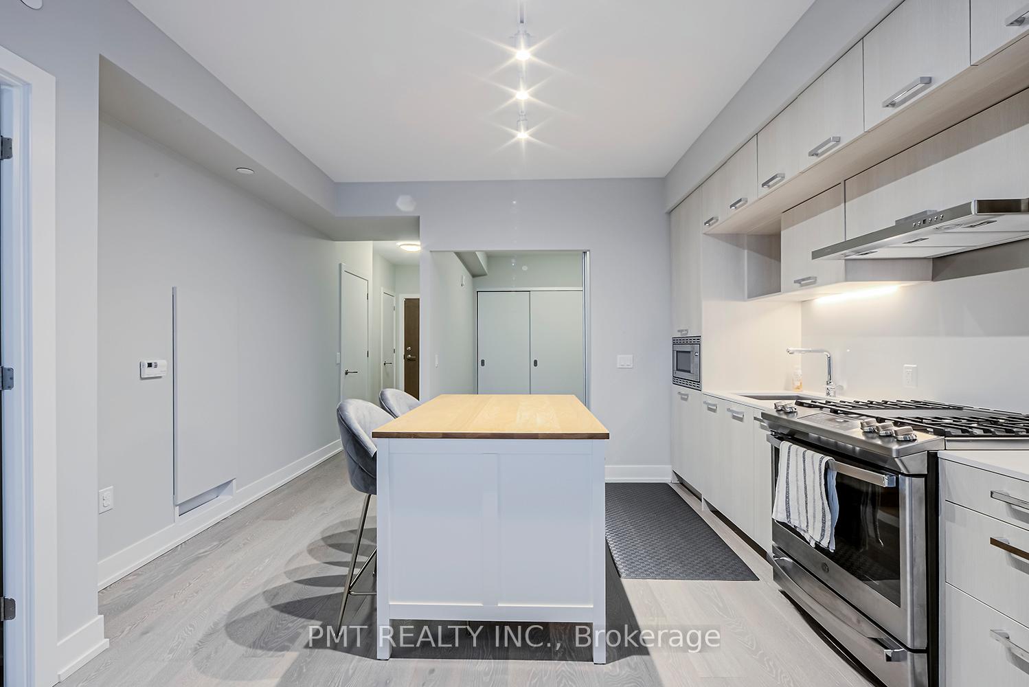 Photo 5 of Unit 105, 1331 Queen Street E, Toronto, Greenwood-Coxwell — HOMEH