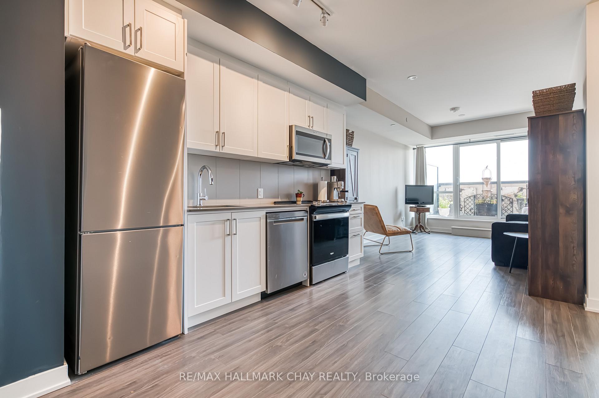 Photo 3 of Unit 217, 681 Yonge Street N, Barrie, Painswick South — HOMEH