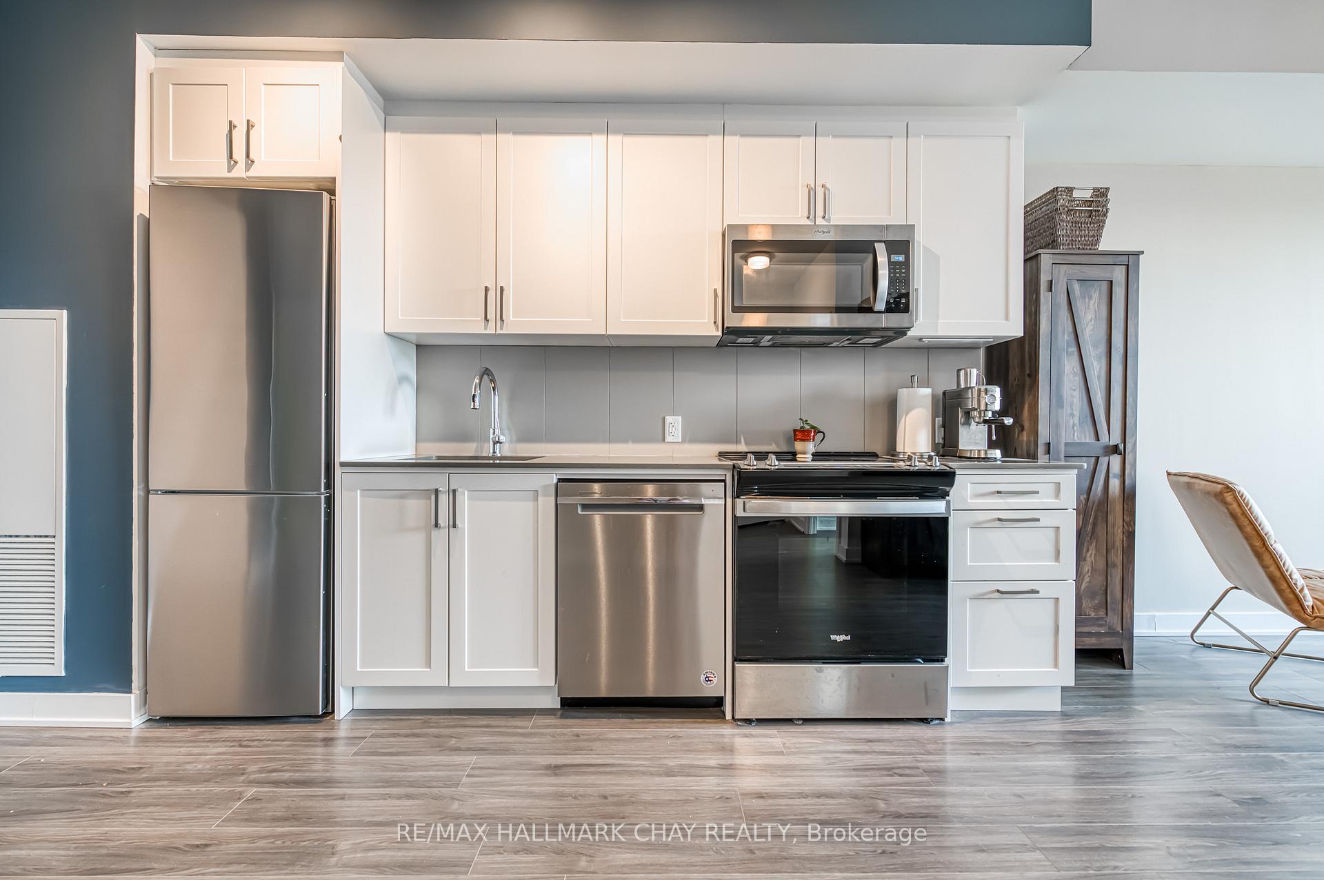 Photo 5 of Unit 217, 681 Yonge Street N, Barrie, Painswick South — HOMEH
