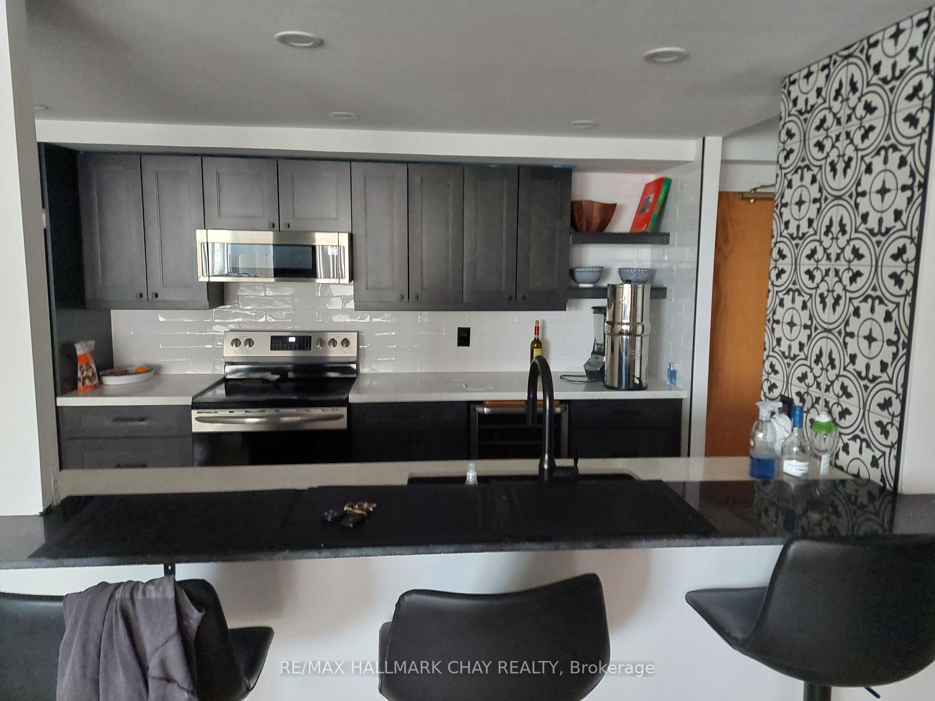 Photo 5 of Unit 306, 65 Ellen Street, Barrie, City Centre — HOMEH