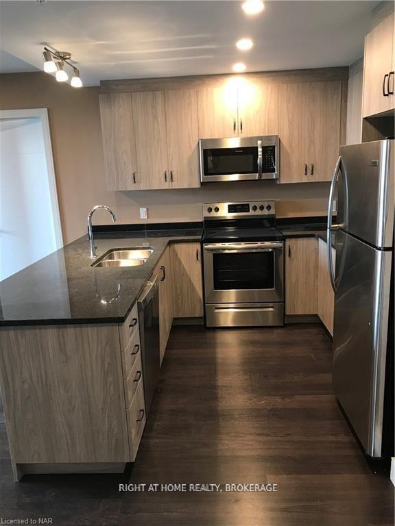 Photo 12 of Unit 403, 300 Fourth Avenue S, St. Catharines, Ridley — HOMEH