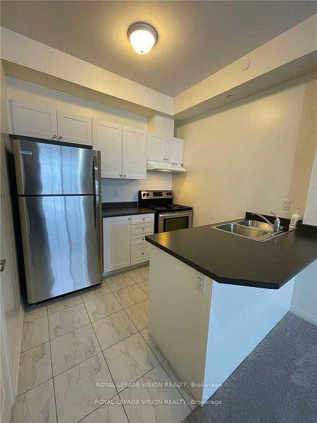 Photo 2 of Unit 419, 80 Aspen Springs Drive, Clarington, Bowmanville — HOMEH