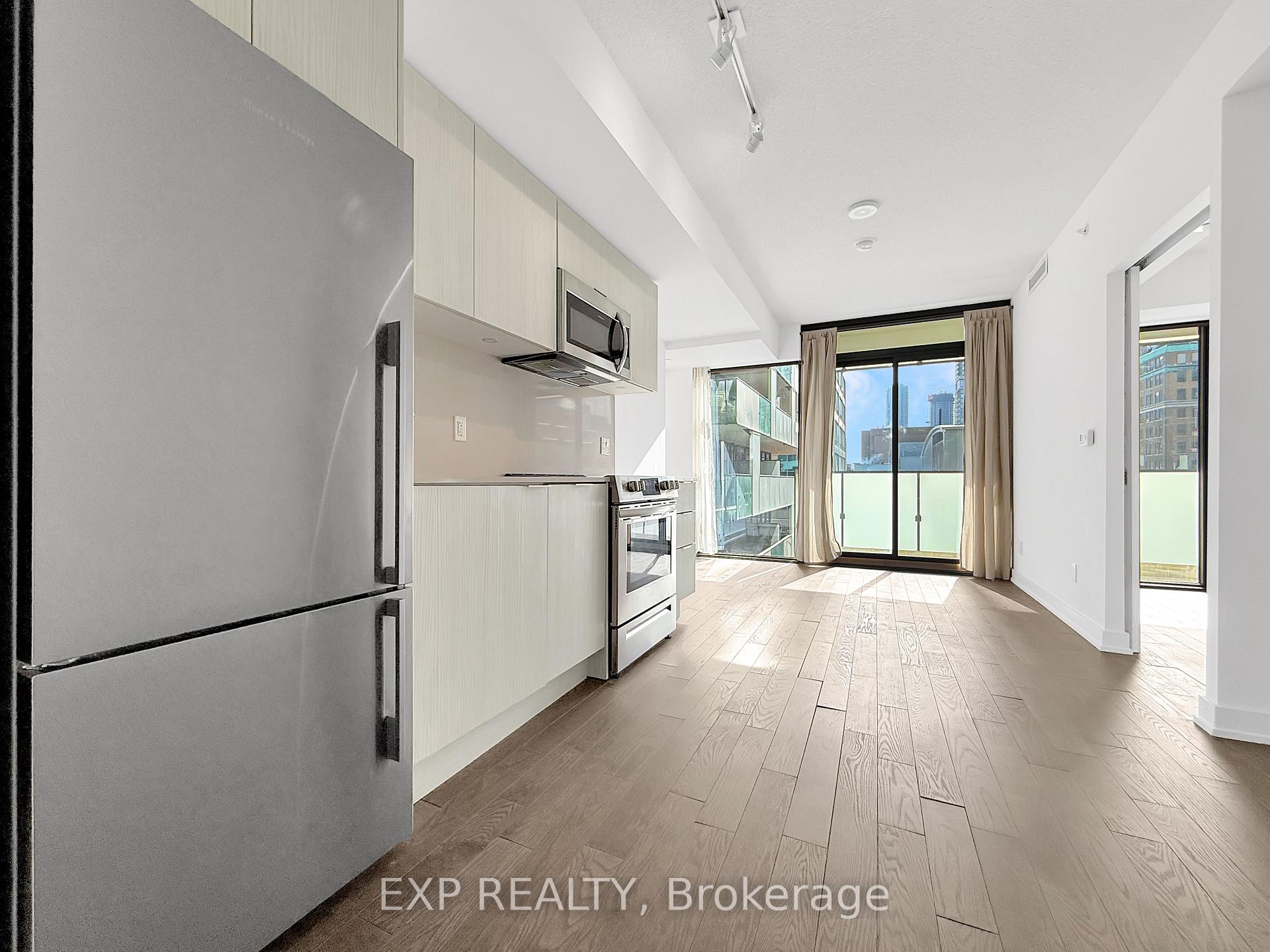Photo 4 of Unit 1408, 25 Richmond Street E, Toronto, Church-Yonge Corridor — HOMEH