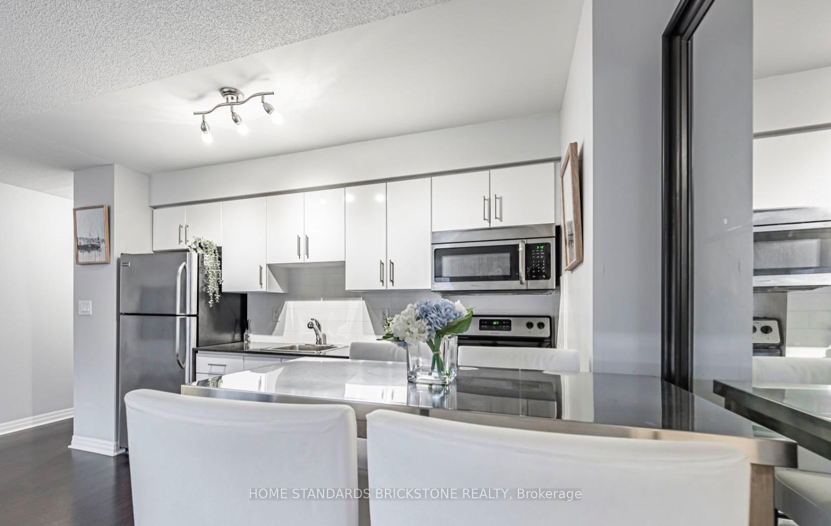 Photo 5 of Unit 301, 30 Herons Hill Way, North York, Henry Farm — HOMEH