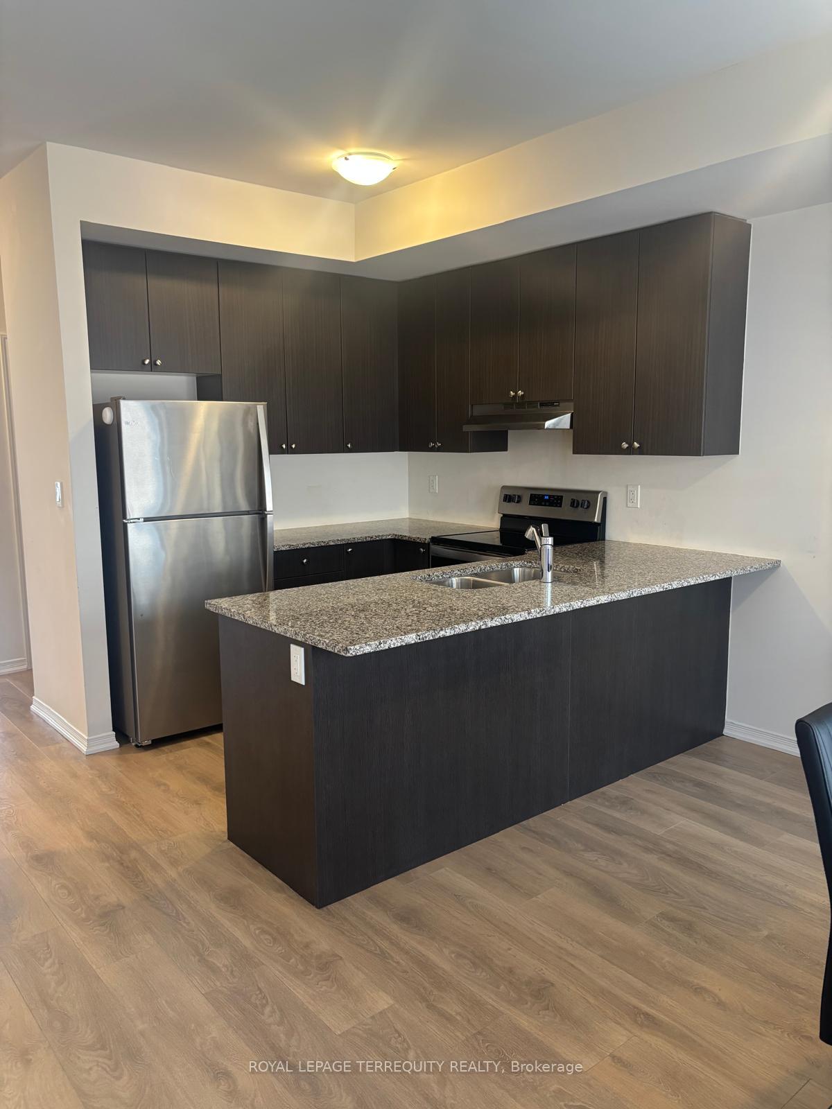 Photo 4 of Unit 118, 2557 Barbarolli Path, Oshawa, Windfields — HOMEH