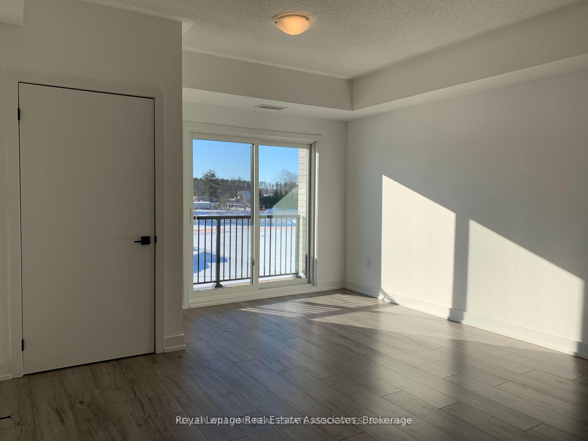 Photo 3 of Unit 406, 10 Culinary Lane, Barrie, Innis-Shore — HOMEH