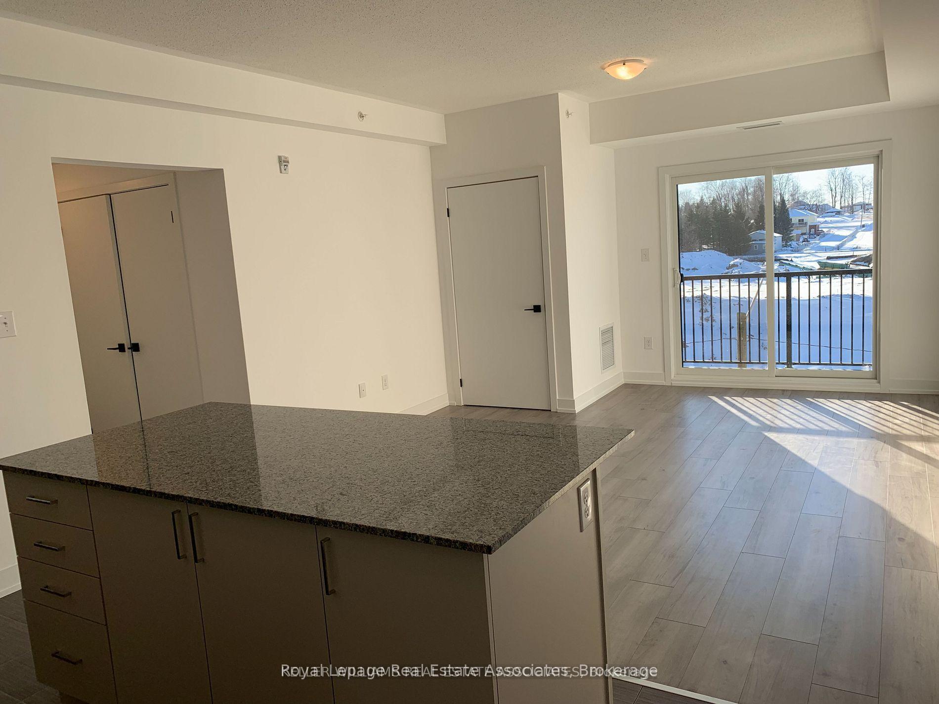 Photo 4 of Unit 406, 10 Culinary Lane, Barrie, Innis-Shore — HOMEH