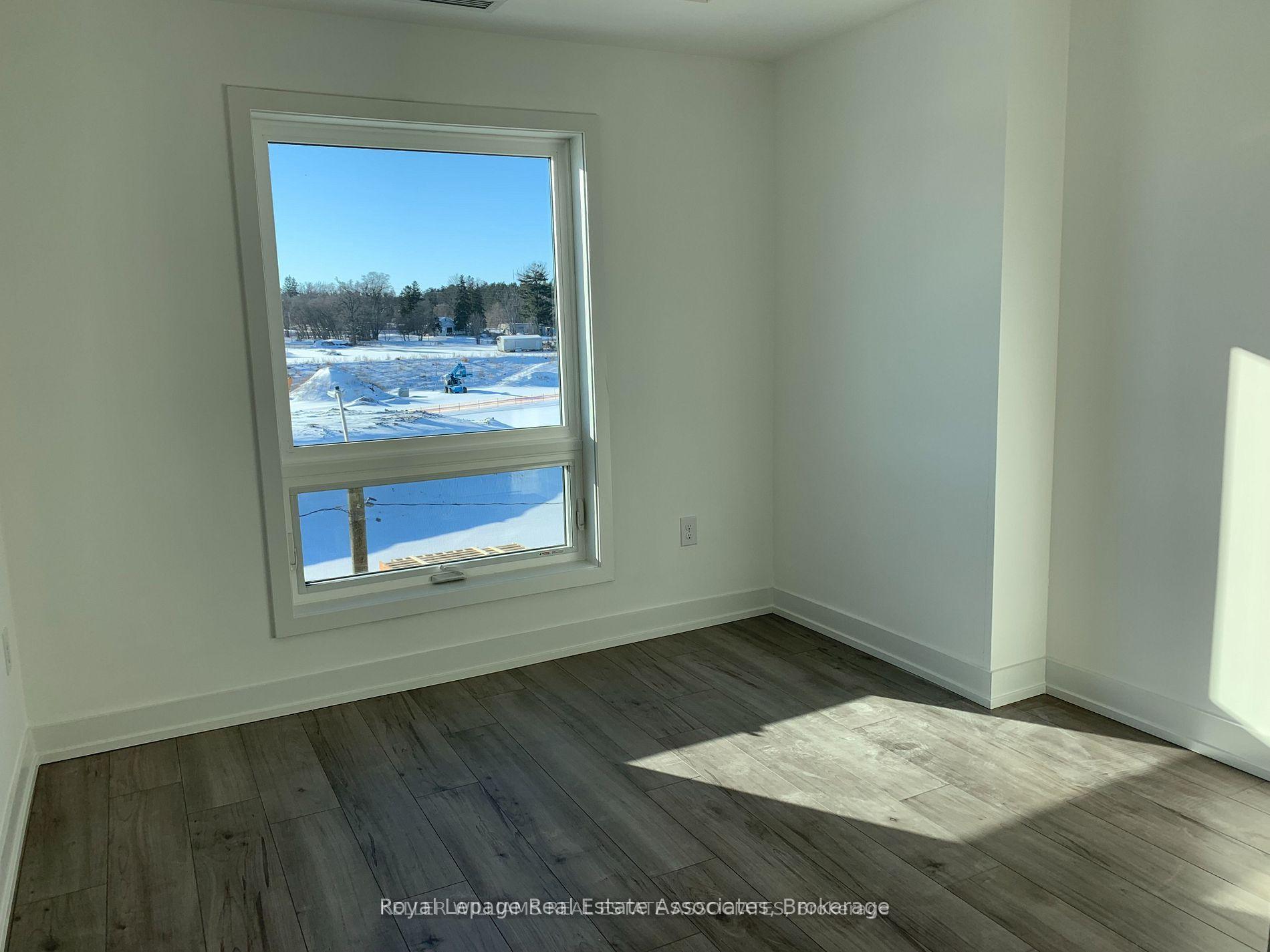 Photo 8 of Unit 406, 10 Culinary Lane, Barrie, Innis-Shore — HOMEH