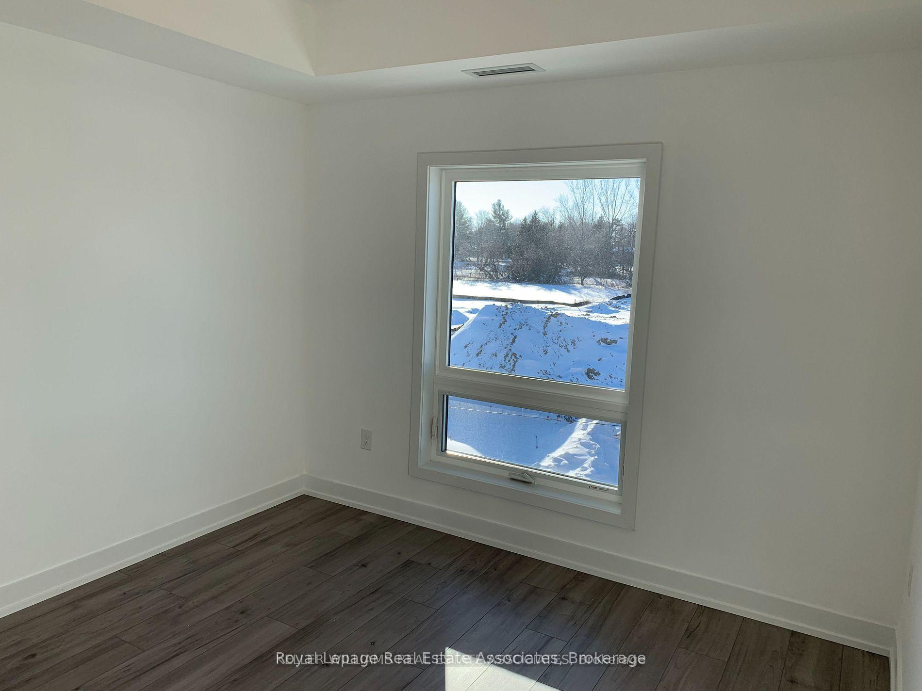Photo 11 of Unit 406, 10 Culinary Lane, Barrie, Innis-Shore — HOMEH