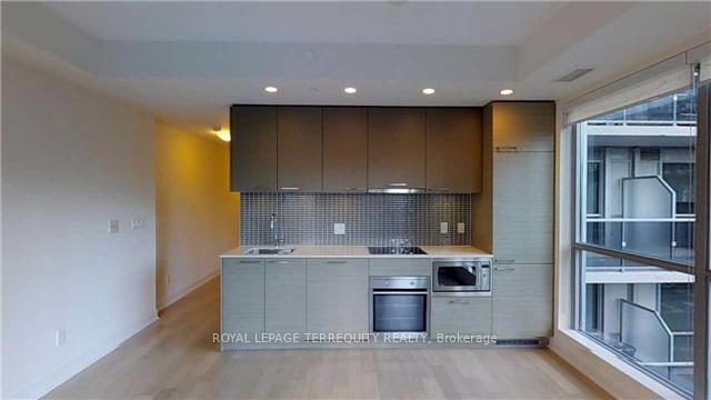 Photo 3 of Unit 609, 55 Front Street E, Toronto, Waterfront Communities — HOMEH